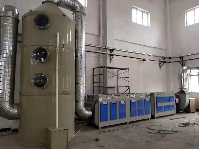 Wet scrubber tower installation showing spray system and packing